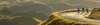 Biker riding a mountain bike on rocks - Snotshop