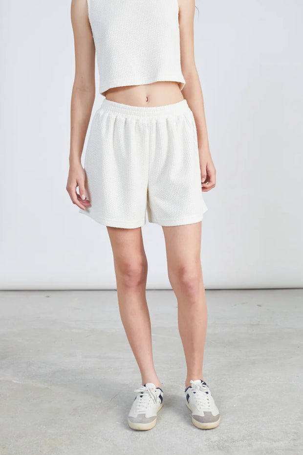 Divertiti con i pantaloncini bianchi lavorati a maglia 24 Colours!